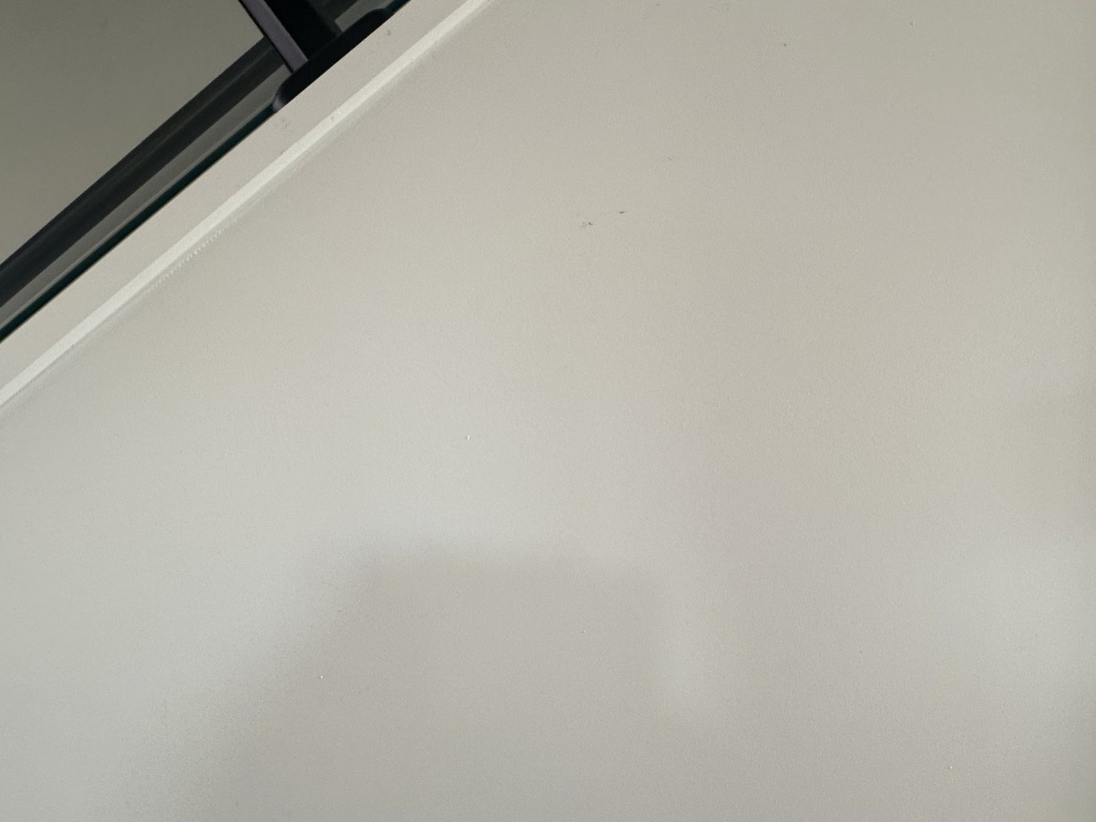 Bare wall beside a staircase in Pakuranga before the mirror was hung