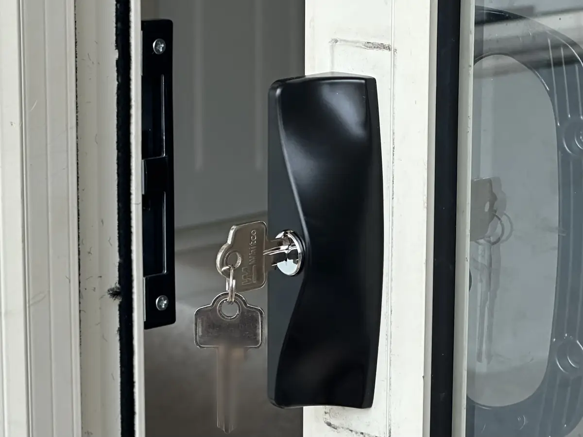 The same sliding door in Botany with a keyed Whitco lock fitted and the key turned in the barrel
