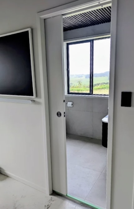 Cavity sliding door before adjustment, East Tamaki Heights