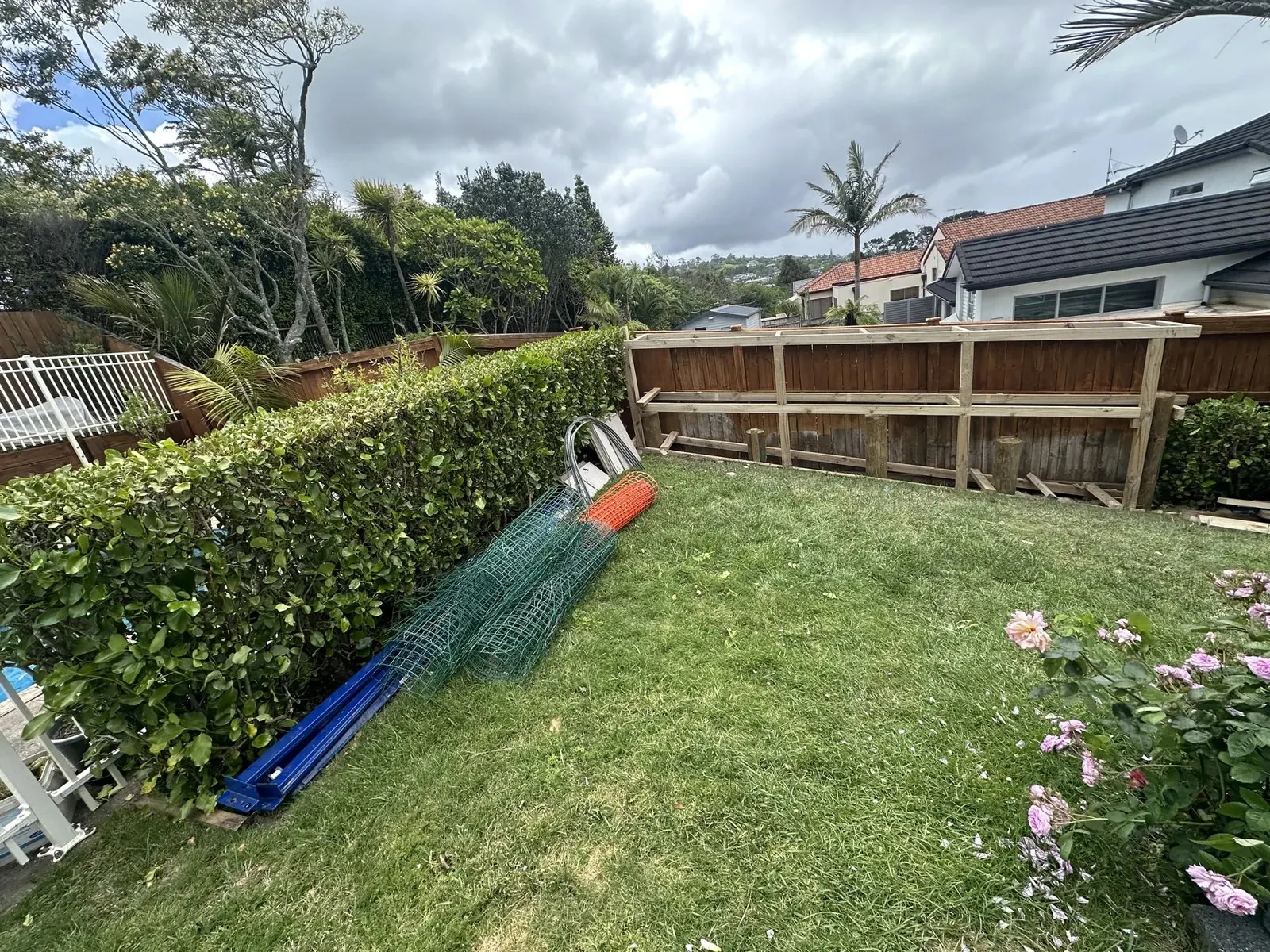 Cleared sloping garden site prepared for a custom storage shed in Dannemora