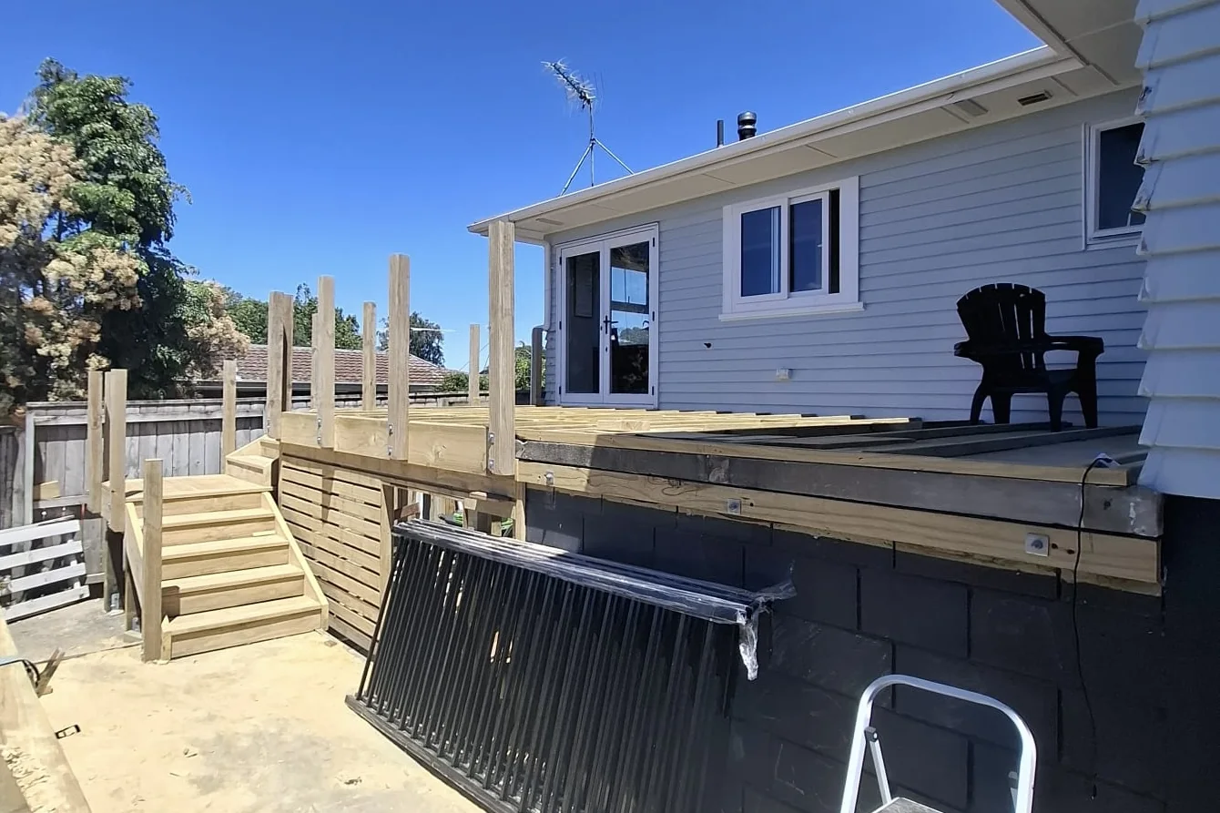 New decking boards being laid over the rebuilt frame