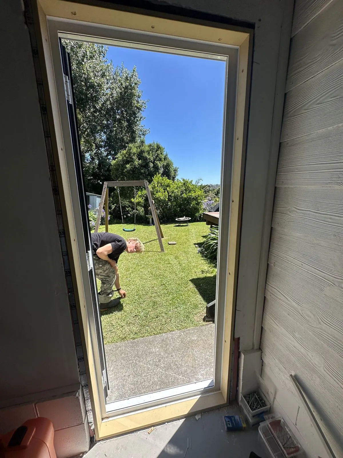 View through the new front door from inside during fitting, Half Moon Bay