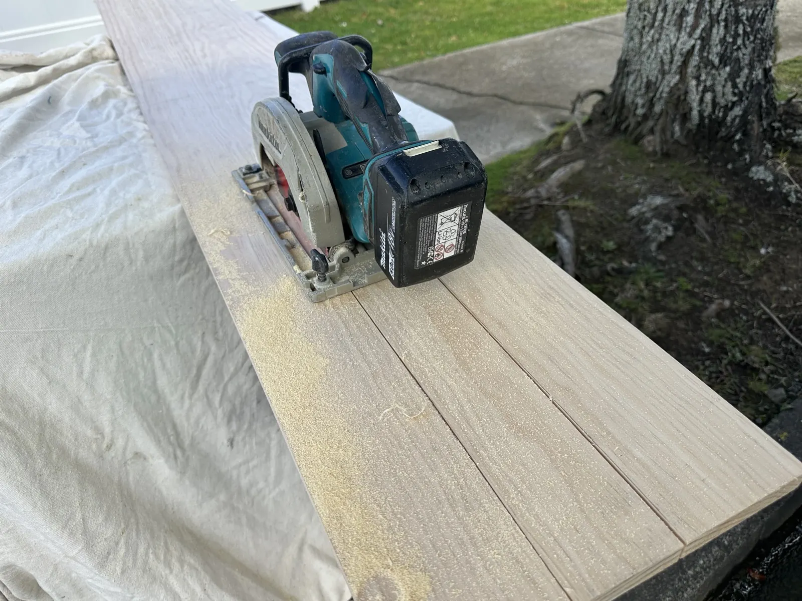 Circular saw cutting dressed timber to length for a custom picture frame