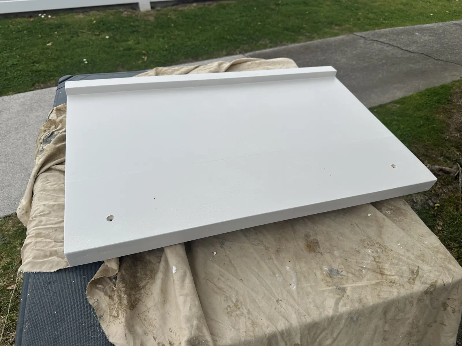 Custom picture frame filled, primed and painted, showing the bottom support ledge