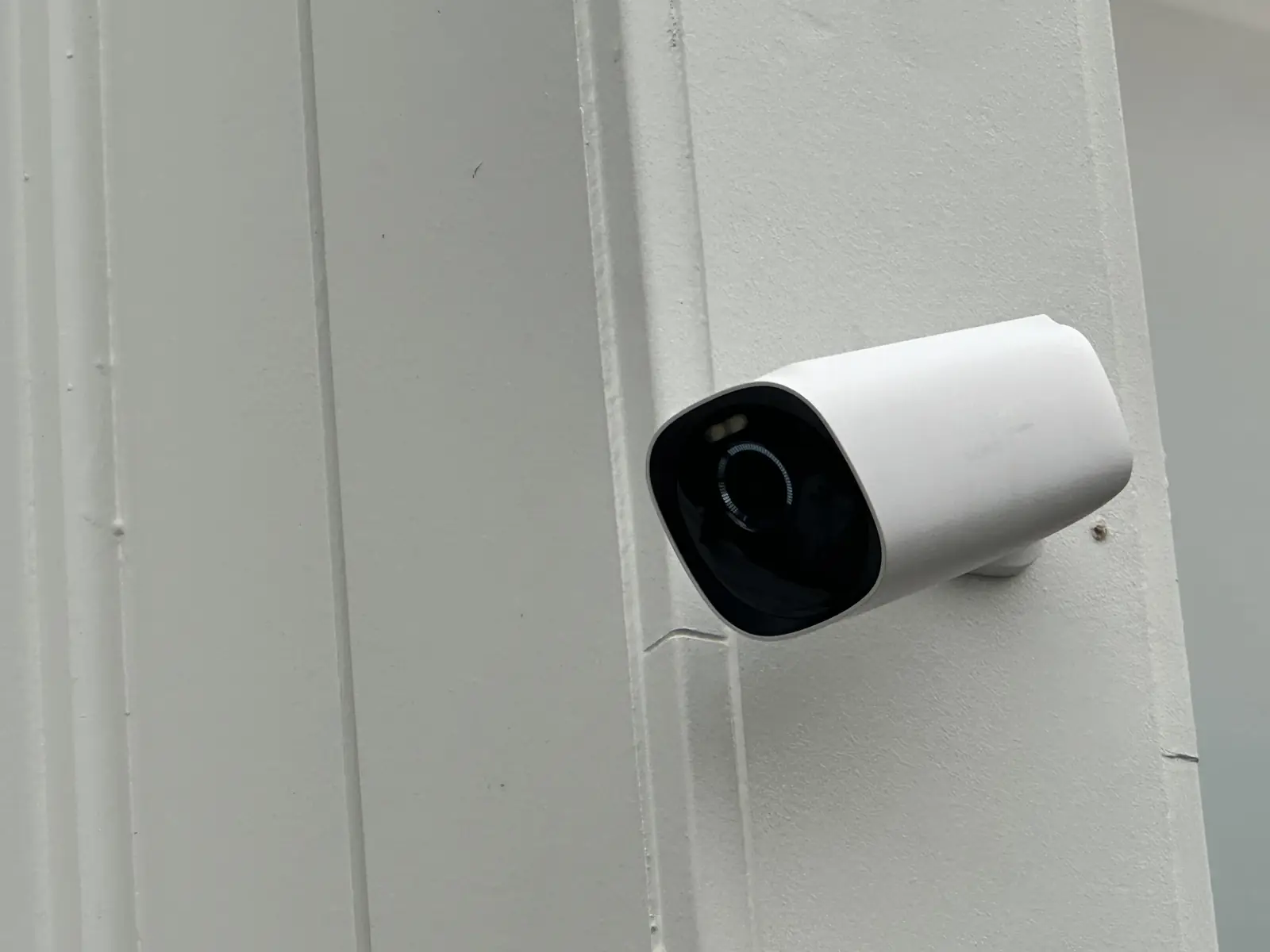 eufyCam S330 camera mounted on the white weatherboard wall of a Sunnyhills house