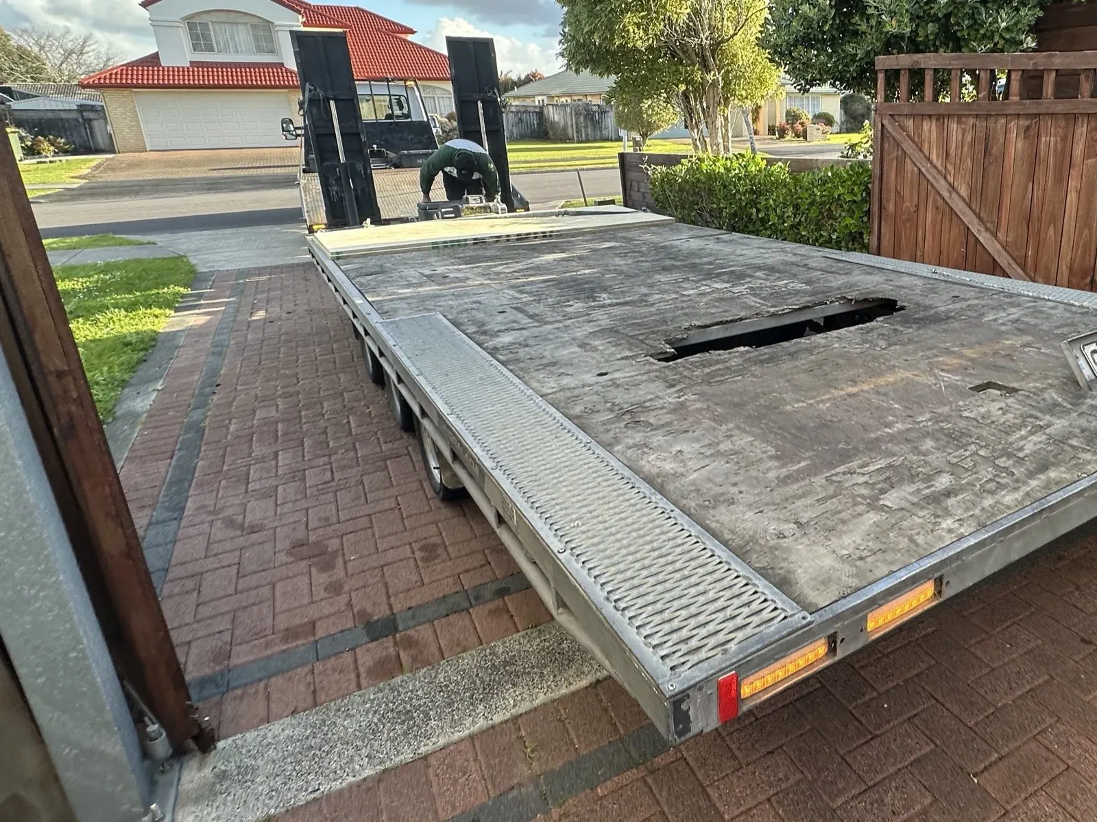 Flat-deck trailer in East Tamaki with a hole worn through the plywood floor