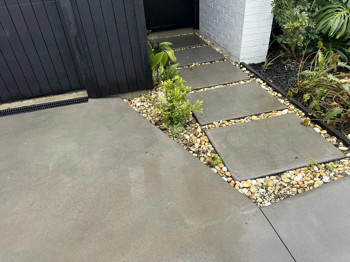 The finished front entrance in Pakuranga after water blasting, pavers and driveway section clean and even