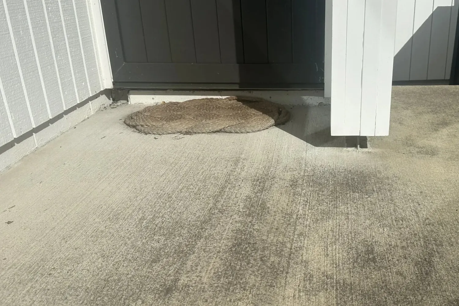 Concrete entry area before new decking installation in Cockle Bay, February 2026